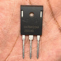 75amps 1200volts HH75N120HA IGBT Solar Inverter IGBT-digilog.pk - close-up view of a black, rectangular electronic component with three metal pins held in a person's palm.