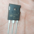 75T65 FGH75T65SQDT TO-247 FGH75T65 75T65 TO247 High Power IGBT 650V 75A - a black, three-pin TO-247 electronic component held in a person's hand, showing the printed model number 75T65 on its surface.
