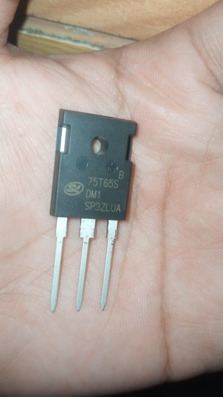 75T65 FGH75T65SQDT TO-247 FGH75T65 75T65 TO247 High Power IGBT 650V 75A - a black, three-pin TO-247 electronic component held in a person's hand, showing the printed model number 75T65 on its surface.
