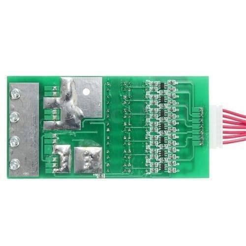 7s 24V 20A 18650 Lithium Lion Battery Charger Module Protection Board BMS PCB With Wire - a green rectangular PCB with soldered metal terminals and a white connector with red wires.
