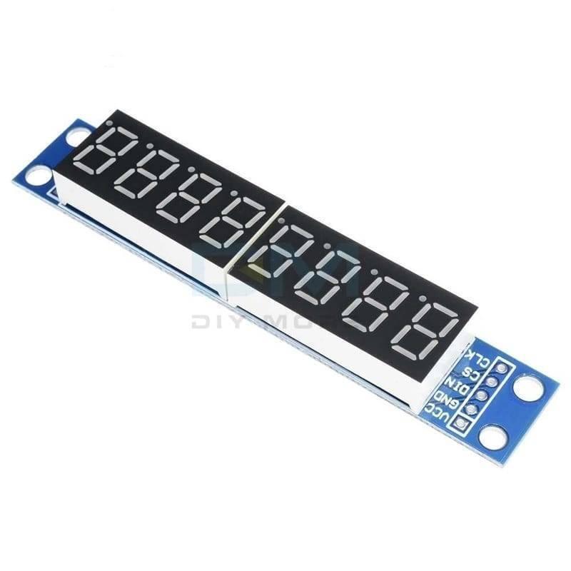 8 Digit 7 Segment Module Assembled MAX7219 - a blue rectangular circuit board featuring an eight-digit display and five labeled pins: VCC, GND, DIN, CS, CLK.