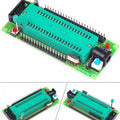 8051 89C51 89S51 Development board Microcontroller Programm Downloader - a green PCB with a large ZIF socket, a reset button, a power switch, a DC jack, and a crystal oscillator.