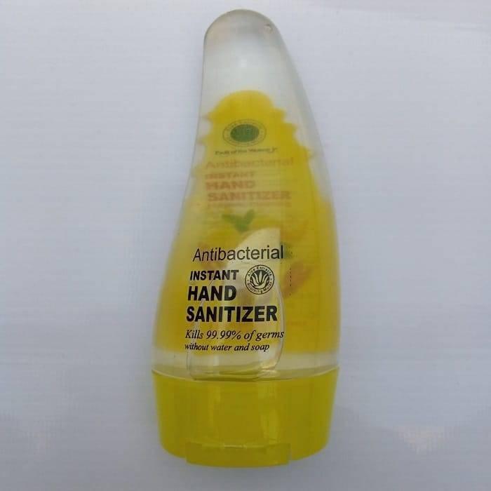 80ML Instant Liquid Soap Hand Sanitizer - a yellow, translucent, teardrop-shaped squeeze bottle with a yellow cap and antibacterial label.
