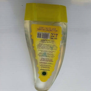 80ML Instant Liquid Soap Hand Sanitizer - clear plastic bottle with a yellow cap, showing the product label with ingredients and expiration date.