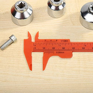 80mm Plastic Vernier Caliper | Dual Scale Mini Measuring Tool - shown in orange with three metal socket tools and a small bolt on a wooden surface.