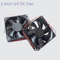 80mm x 80mm X25MM 12V DC Exhaust Fan 3 Inch x 3 Inch 12V Fan - two black square cooling fans with seven blades each and red and black power wires.