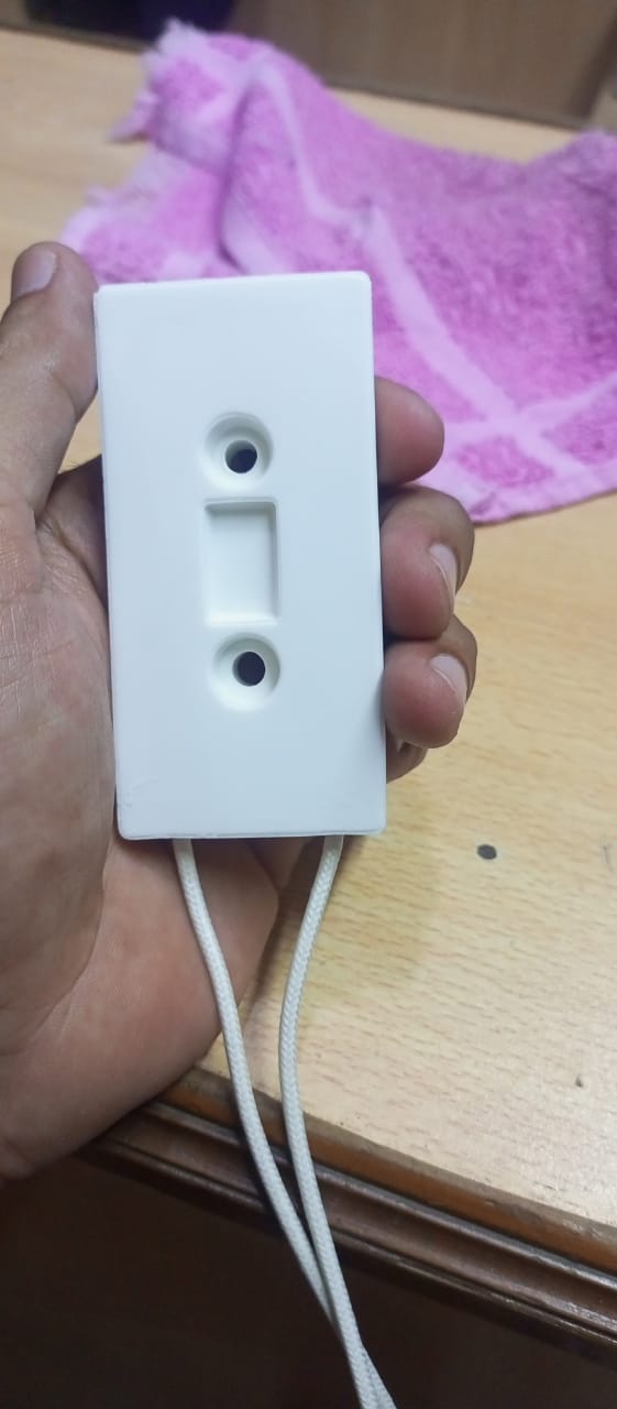 80W 20RJ Ceramic Power Braking Resistor VFD - close-up of a white rectangular ceramic component held in a hand with two white wires extending from it.
