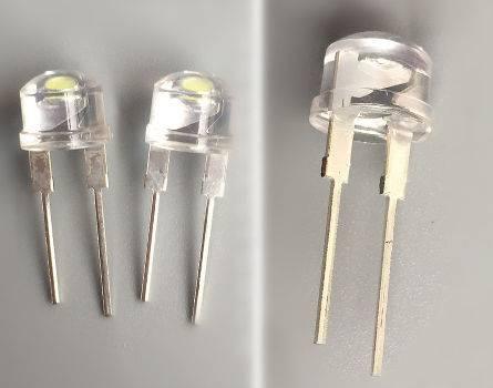 8mm LED Lamp White Color LED 0.5watt - three clear, dome-shaped LED components with two metal pins each, arranged against a grey background.