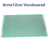 8x12cm Single Side Fiberglass PCB Veroboard Stripboard Circuit Project Board - a rectangular green fiberglass circuit board with a grid of holes and copper contact strips along the two shorter edges.