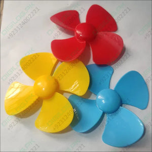 98mm DIY Blade Propeller Plastic Fan For Mini DC Toy Motor - three four-blade plastic fans in red, yellow, and blue arranged on a white surface.