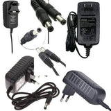 9V 1amp Power Adapter For Arduino Power Supply - a collage of multiple black AC power adapters with various plug types and DC barrel connectors.