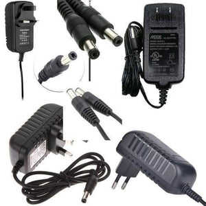 9V 1amp Power Adapter For Arduino Power Supply - a collage of multiple black AC power adapters with various plug types and DC barrel connectors.