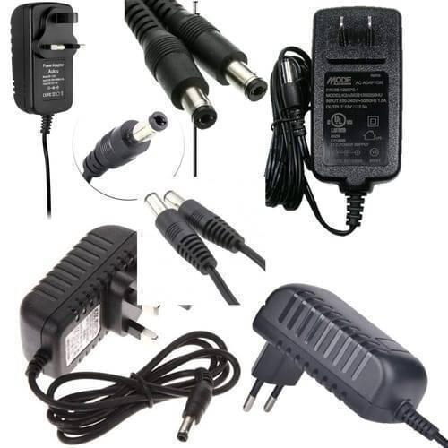 9V 1amp Power Adapter For Arduino Power Supply - a collage of multiple black AC power adapters with various plug types and DC barrel connectors.