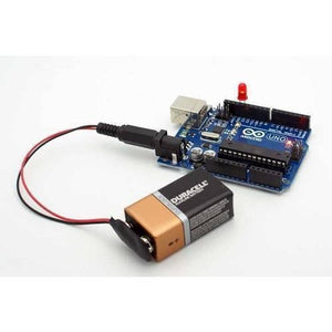 9V Battery Snap Connector To DC Male Power Adapter Cable For Arduino - connected to a 9V battery and an Arduino Uno board.