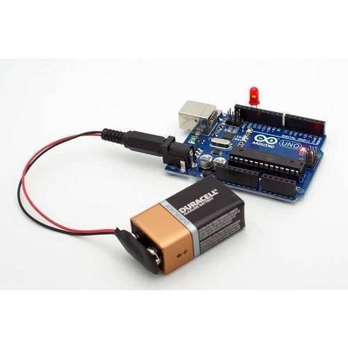 9V Battery Snap Connector To DC Male Power Adapter Cable For Arduino - connected to a 9V battery and an Arduino Uno board.