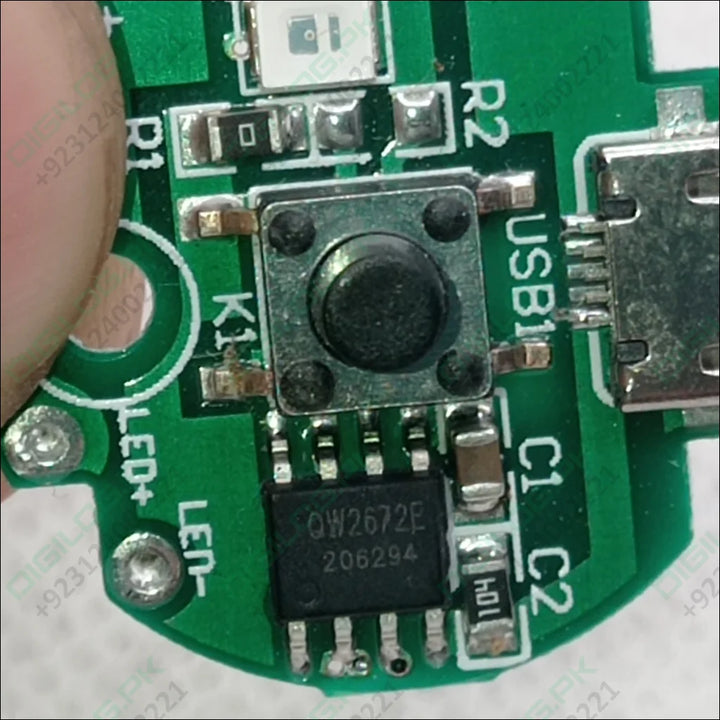 Green circuit board with electronic components for QW2672 Emergency Light Controller Module