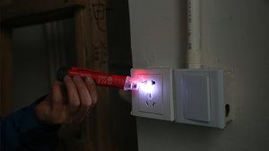 UNI-T UT12D voltage detector checking a cable