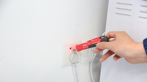UNI-T UT12D voltage detector with flashlight in use