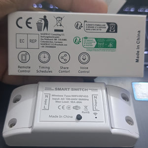 W601 smart switch packaging showing remote control, schedules, shared control and voice control