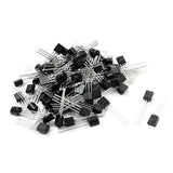 A1015 PNP Transistor - shown as a large pile of small black three-pin electronic components with two individual units placed separately to the right.