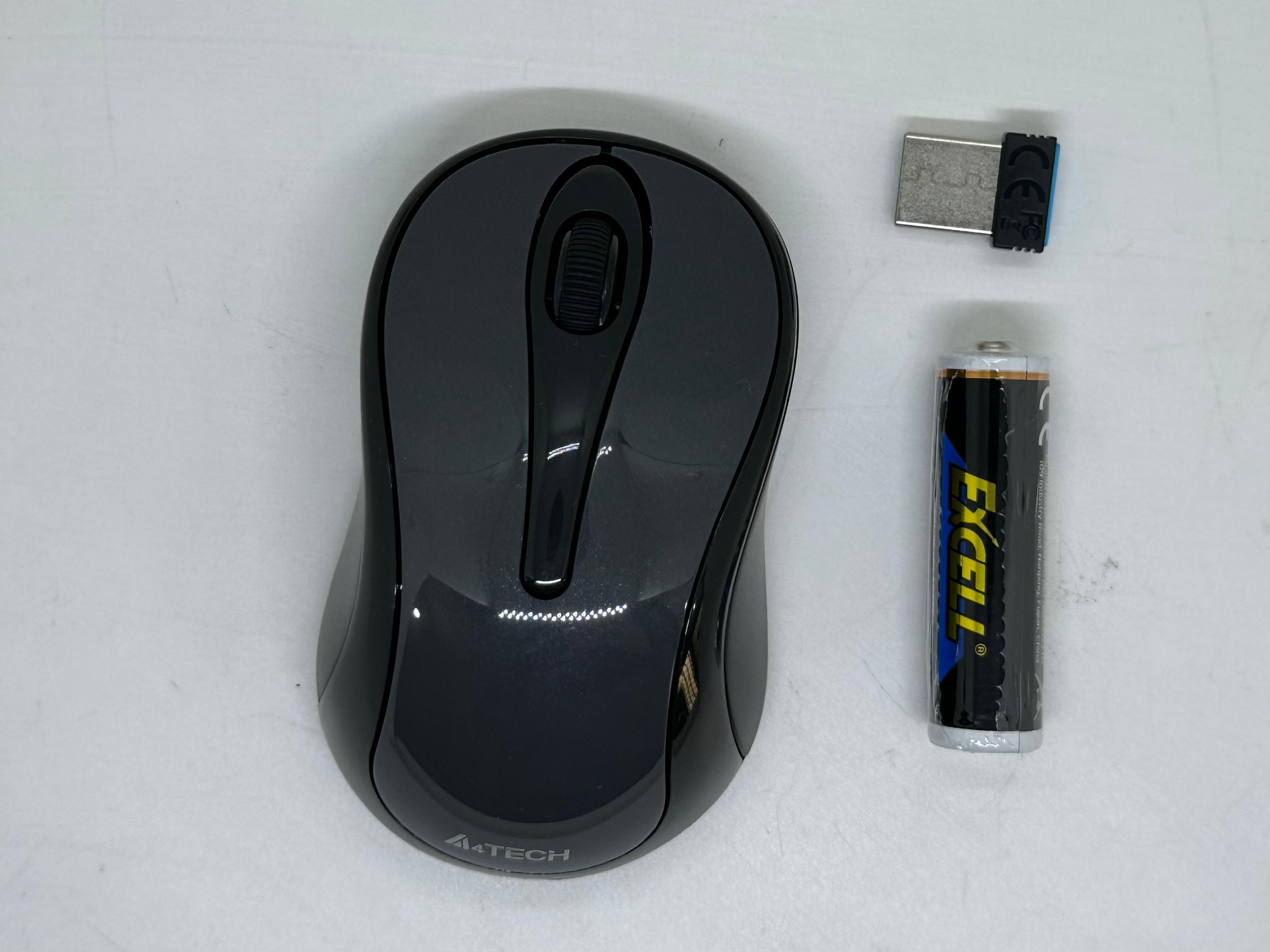 A4tech G3-280NS 2.4g Wireless Mouse – 1200 Dpi V-track Silent - a dark grey wireless mouse with a scroll wheel, a USB receiver, and an Excell battery on a white surface.