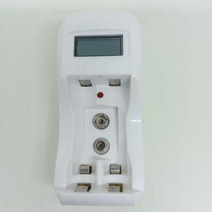 AA Ad AAA Cell And Battery Charger 1.2V And 9V - a white plastic charging unit featuring a blank LCD screen, a red indicator light, and battery slots.