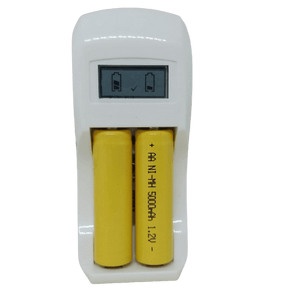 AA Ad AAA Cell And Battery Charger 1.2V And 9V - with a white plastic body, a digital display showing battery status, and two yellow AA batteries inserted.