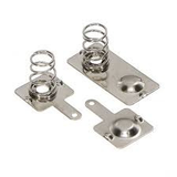 AA Cell Spring Contact Set - three silver-colored metal battery terminal plates with springs and contact points arranged on a white background.