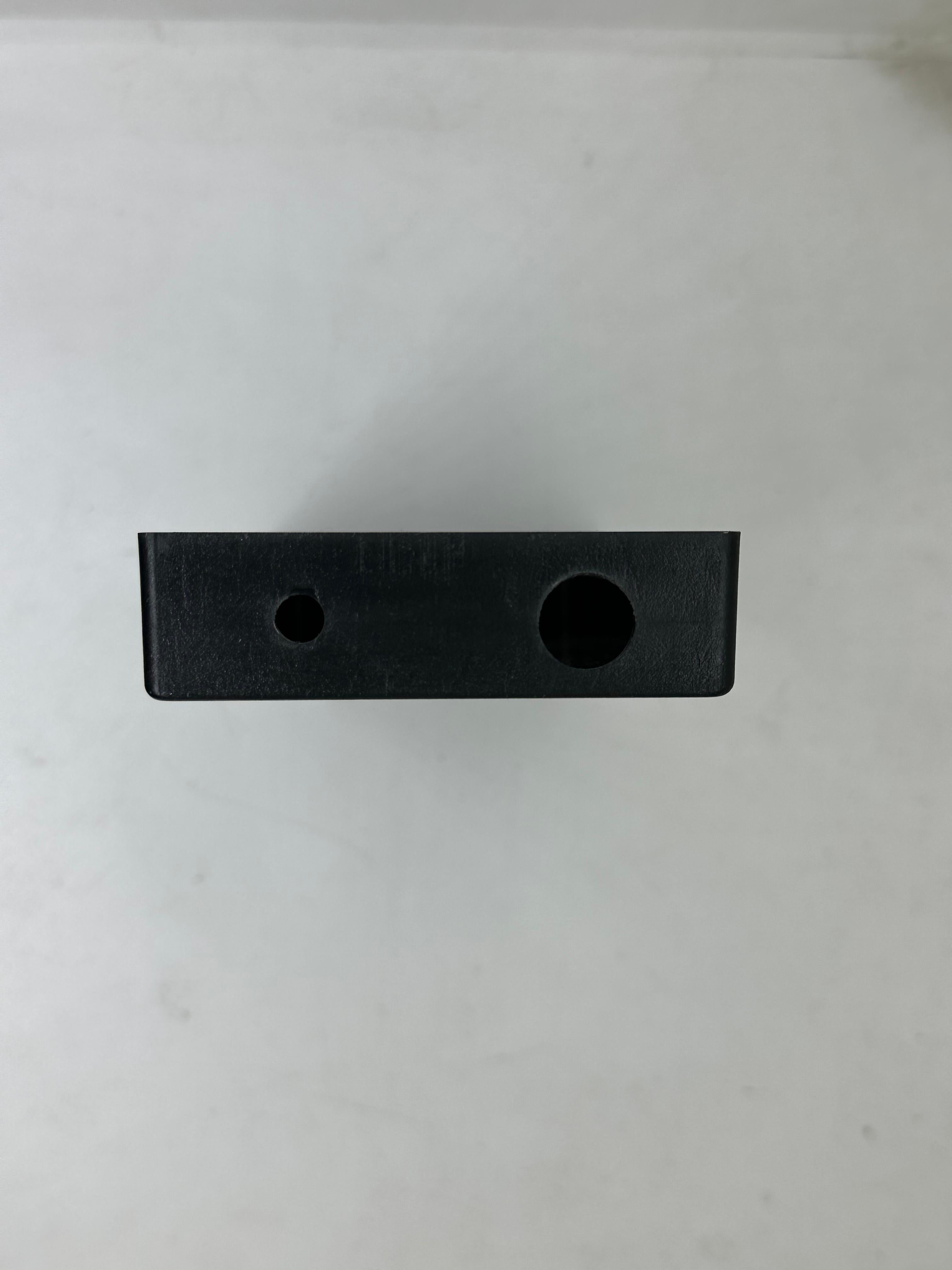 ABS Enclosure Box For WiFi Router - a close-up of the black rectangular plastic housing with two circular port openings on the side panel.