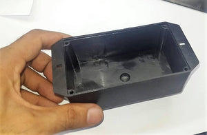 ABS PCB Enclosures Box Electronics Enclosures Box Electronics Project Box - a black rectangular plastic electronics project box held in a hand showing the open interior and mounting holes.