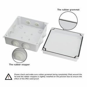 ABS Plastic Dust Proof Junction Box Universal Electrical Project Enclosure White 150MMX150MMX70MM - the open white enclosure with a rubber lid gasket and rubber cable entry stoppers.