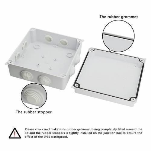 ABS Plastic Dust Proof Junction Box Universal Electrical Project Enclosure White 150MMX150MMX70MM - the open white enclosure with a rubber lid gasket and rubber cable entry stoppers.