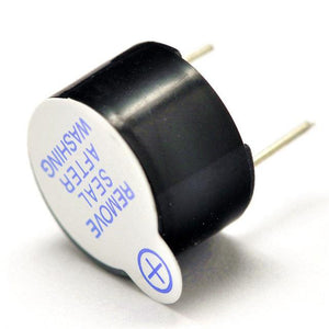 Active Piezo Buzzer 3V To 12V Active Buzzer for Arduino - a black cylindrical electronic component with two metal pins and a white label reading REMOVE SEAL AFTER WASHING.