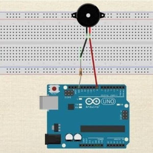 Active Piezo Buzzer 3V To 12V Active Buzzer for Arduino - connected to a breadboard and an Arduino Uno board with jumper wires and a resistor.