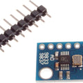 AD9833 AD9837 Programmable Signal Function Generator - Dds For Arduino - a blue circuit board with an integrated chip and a separate strip of metal header pins.