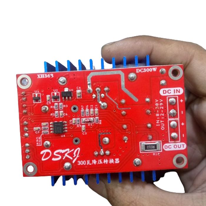 Adjustable 300W XL4016 DC To DC Step Down Buck Converter Module - its red circuit board, blue heatsink, and DC IN/OUT terminals.