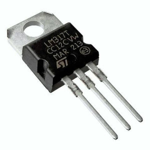 Adjustable Voltage Regulator LM317 - a black three-pin electronic component with a metal mounting tab and printed text on its face.