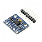 ADXL345 Tripple Axis Accelerometer Module - a blue rectangular circuit board with labeled pin headers and a separate strip of eight metal pins.