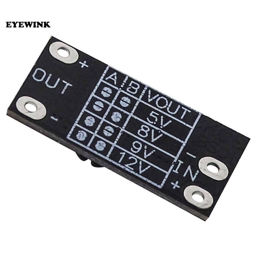 AL253 Boost Converter For Internet Router 5V 9V 12 DC Output Mini Converter Boost Step Ptcl D Link Tp Link - a small black rectangular circuit board with four soldering pads for input and output and a printed voltage selection table.