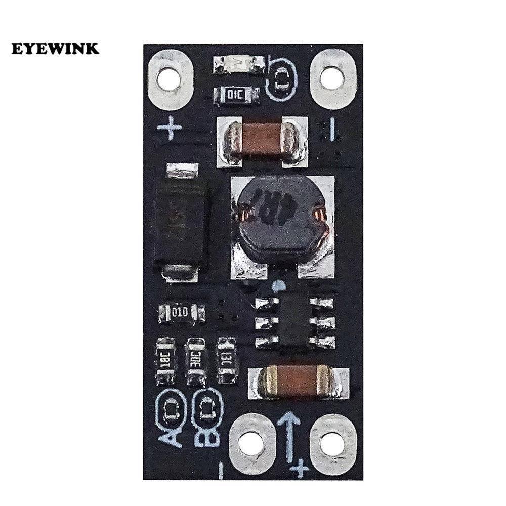 AL253 Boost Converter For Internet Router 5V 9V 12 DC Output Mini Converter Boost Step Ptcl D Link Tp Link - a small black rectangular circuit board with a central inductor, a six-pin integrated circuit, and four circular connection pads.