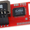 Aladdin Xt Plus 2 Xbox Mod Chip - a red circuit board featuring a black SST 49LF020 chip in a socket and a Lattice LC4032V chip.