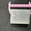 Aluminium Heat Sink For Ssr Relay LED COB And DIY Products - shown in a top-down view being measured by a pink plastic vernier caliper.