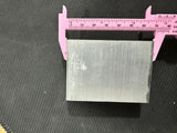 Aluminium Heat Sink For Ssr Relay LED COB And DIY Products - shown in a top-down view being measured by a pink plastic vernier caliper.