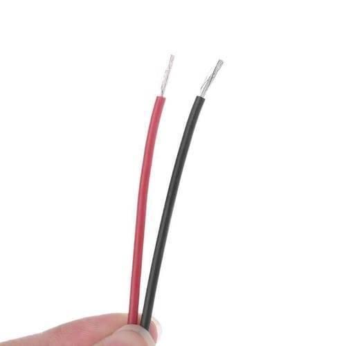 Aluminium Thermostat Heating Element Plate 12V 70℃ - a close-up of the red and black power wires with stripped, exposed ends held by a hand.