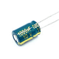 Aluminum Electrolytic Capacitor 1000U 10V F - Buy Online at Digilog.pk - a green cylindrical electronic component with two metal lead wires extending from one end.