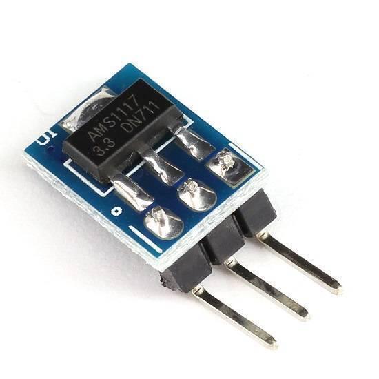 AMS1117-3.3 DC Voltage Regulator 3pin Step-down Power Supply Module - a blue rectangular circuit board with a black chip labeled AMS1117 3.3 and three metal pins extending from one side.