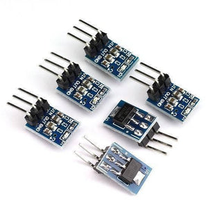 AMS1117-3.3 DC Voltage Regulator 3pin Step-down Power Supply Module - a top-down view of six blue circuit boards with three-pin connectors and surface-mounted components.