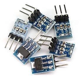 AMS1117-3.3 DC Voltage Regulator 3pin Step-down Power Supply Module - shown as a group of six small blue rectangular circuit boards with three-pin connectors and surface components.