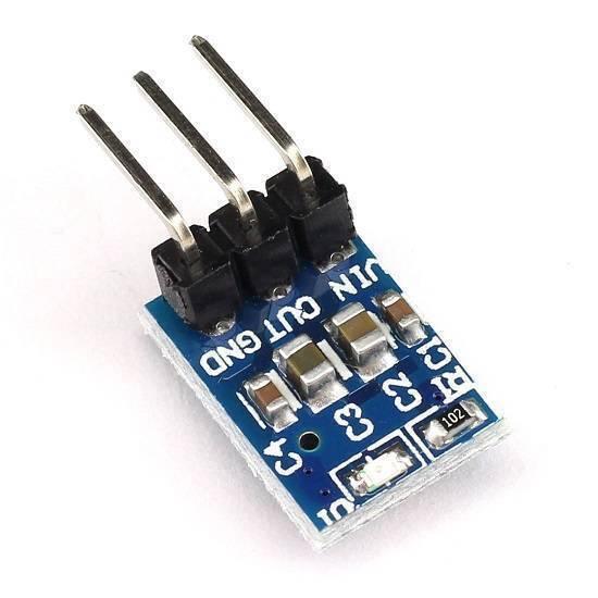 AMS1117-3.3 DC Voltage Regulator 3pin Step-down Power Supply Module - a small blue rectangular circuit board with three silver header pins and surface-mounted components.