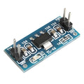 AMS1117 3.3V Power Module Voltage Conversion Step-down Module - a blue rectangular circuit board featuring a black integrated circuit, two two-pin headers, an LED, and surface-mount components.
